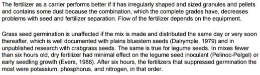 Mixing fertilizer and seed.JPG