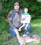 Me Cade and My First Bow Deer.JPG